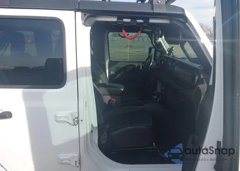 2023 Jeep Wrangler 4-Door Freedom 4X4 z USA, uszkodzony, nr VIN 1C4HJXDN2PW578638